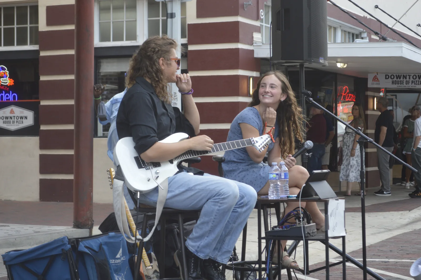 MOJO sharing a laugh during a live set