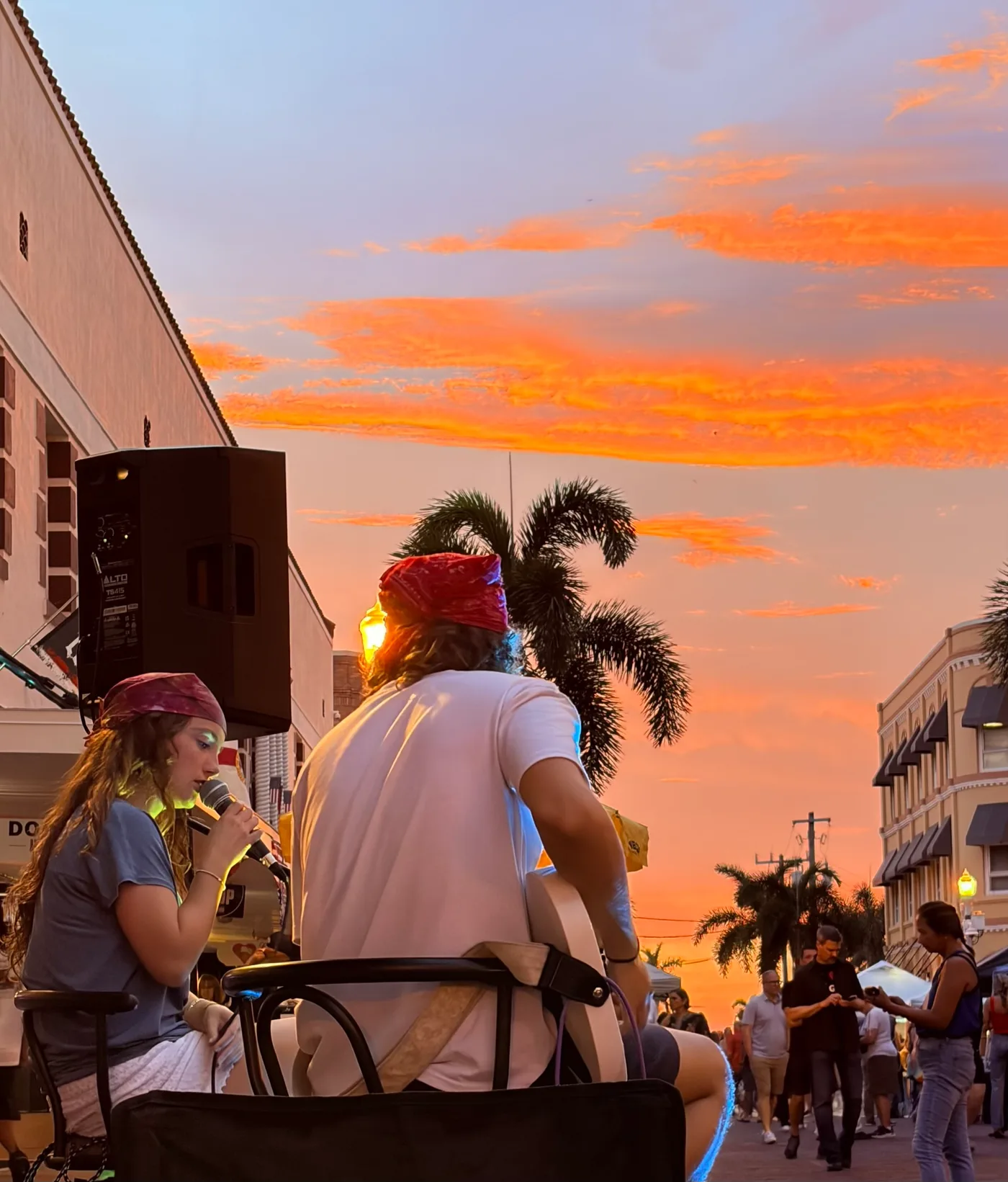 MOJO performing under a sunset sky